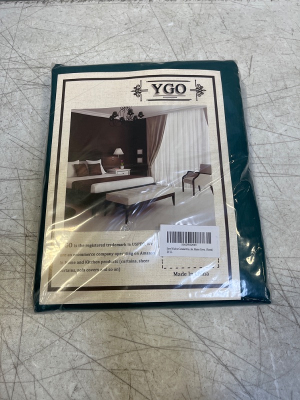 Photo 2 of YGO Sheer Teal Curtains 63 Inches Long for Bedroom - Ring Top Sheer Voile Gauzy Light Filtering Curtains Drapes for Living Room, 2 Panels, Teal Green, 54 Inch x 63 Inch
