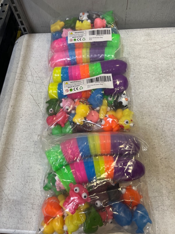 Photo 1 of 3 PACKS - 16PCS Toys Filled Easter Eggs for Boys Prefilled Easter Eggs for Claw machine with Mini Fidget Toys Keychain for Girls Bright Colorful Large Plastic Easter Eggs Gift Filler Easter Party Favors for Kids Toddlers
