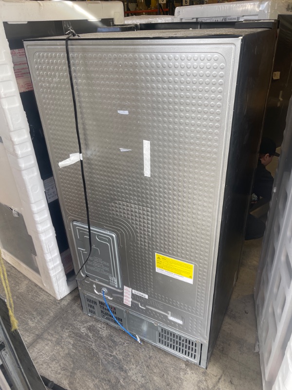 Photo 1 of Samsung - 27.4 Cu. Ft. Side-by-Side Refrigerator - Black stainless steel, INTERIOR VERY CLEAN, EXTERIOR DIRTY/SCUFFED FORM NOT BEING PACAKGED. 
