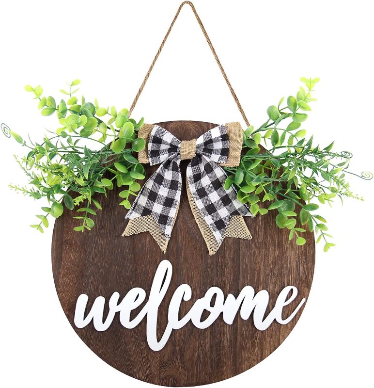 Photo 1 of 3D Welcome Sign Front Door Wall Decor, Rustic Round Wood Sign Hanging Farmhouse Porch Decoration with Artificial Eucalyptus and Burlap Bow for Home Outdoor Indoor (Brown)
