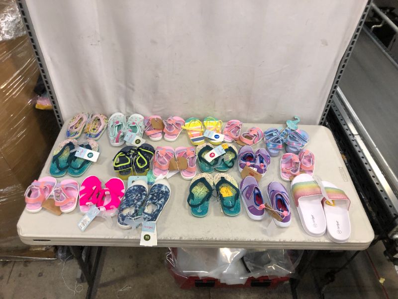 Photo 1 of Assorted Target shoes bundle **ASSORTED SIZES AND STYLES BUNDLE** 