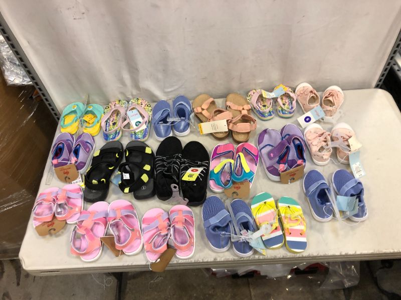 Photo 1 of Assorted Target shoes bundle **ASSORTED SIZES AND STYLES BUNDLE** 