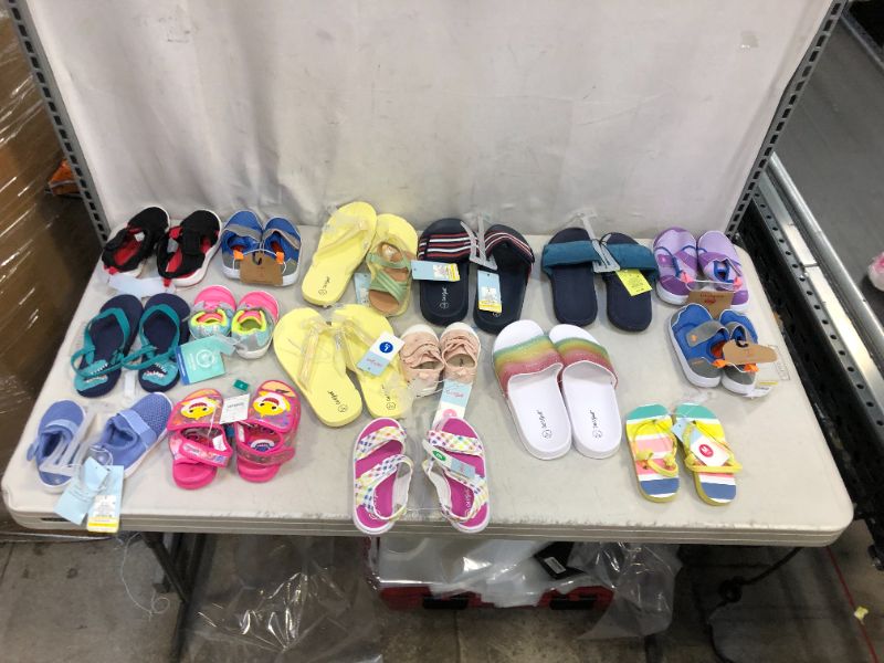 Photo 1 of Assorted Target shoes bundle **ASSORTED SIZES AND STYLES BUNDLE** 