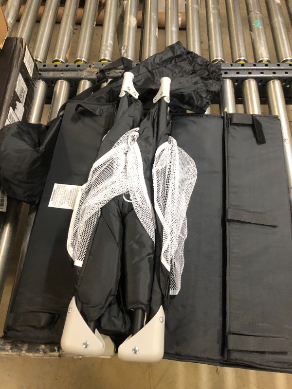 Photo 1 of Dream On Me Zodiak Portable Playard in Black, Lightweight, Packable and Easy Setup Baby Playard, Breathable Mesh Sides and Soft Fabric - Comes with a Removable Padded Mat

