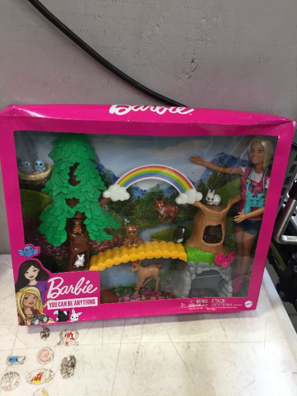 Photo 2 of Barbie Wilderness Guide Interactive Playset with Blonde Barbie Doll (12-in), Outdoor Tree, Bridge, Overhead Rainbow, 10 Animals & More, Great Gift for Ages 3 Years Old & Up
