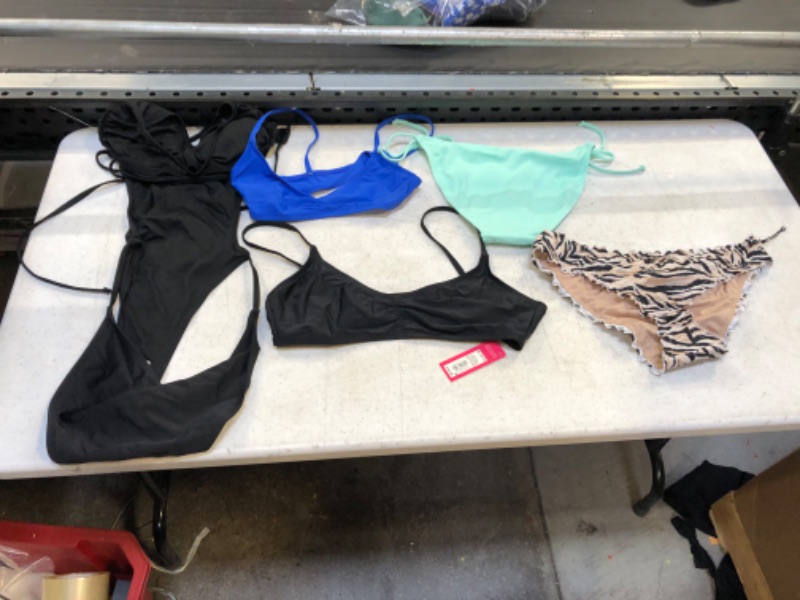 Photo 1 of bundle of women's swimwear various sizes sold as is