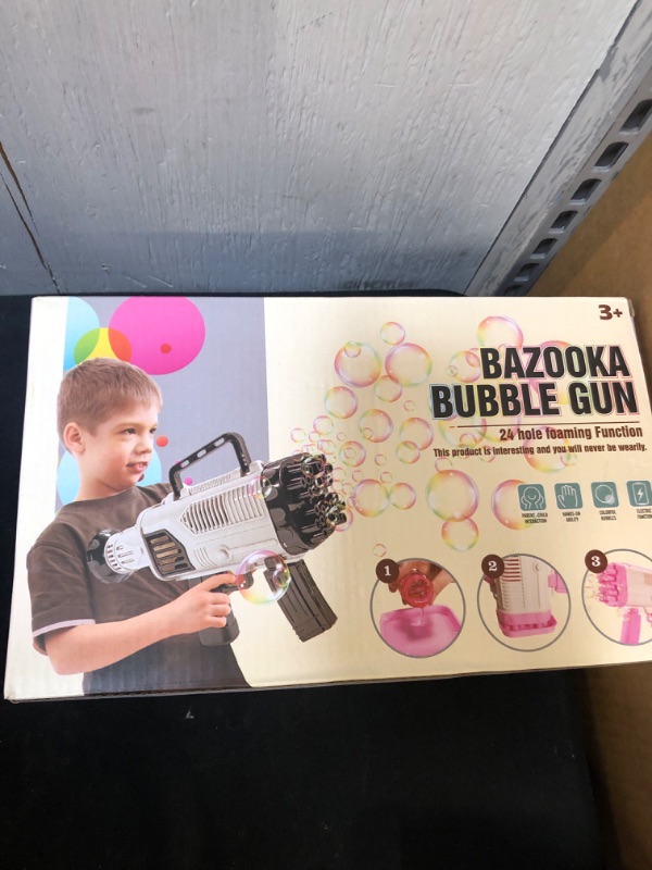 Photo 2 of Bubble Gun Rocket Bubble Blowers Machine, 5000+ Bubbles Per Min,7 Packs Bubble Solution, Big Bubble Blowers Maker for Wedding Summer Party Outdoor Toy, Great Gift Idea for Adults Boys Girls  -- FACTORY SEALED --
