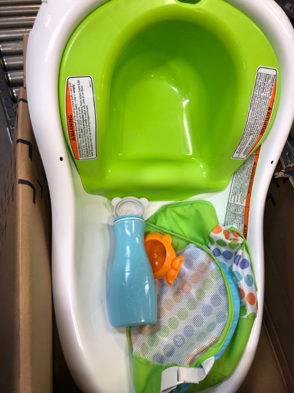 Photo 1 of Fisher-Price 4-in-1 Sling Seat Convertible Baby Bath Tub, Green.
