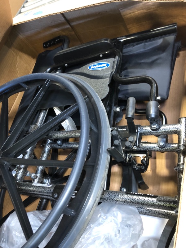 Photo 1 of invacare wheel chair 