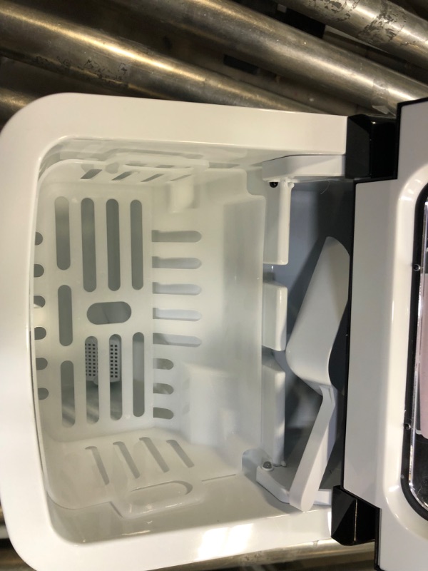 Photo 7 of Frigidaire Compact Countertop Ice Maker, Makes 26 Lbs. Of Bullet Shaped Ice Cubes Per Day, Silver Stainless ----------- SMALL DENTS ON SIDE