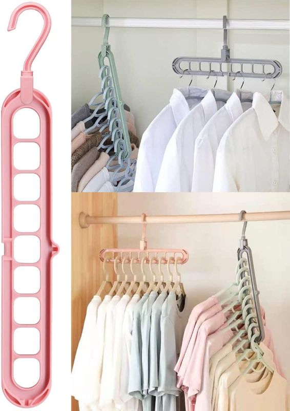 Photo 1 of Closet Organizers and Storage,12 Pack Sturdy Hangers for Closet Organizer, Dorm Room Essentials, Closet Storage, Magic Space Saving Hanger for Wardrobe Heavy Clothes (Pink)
