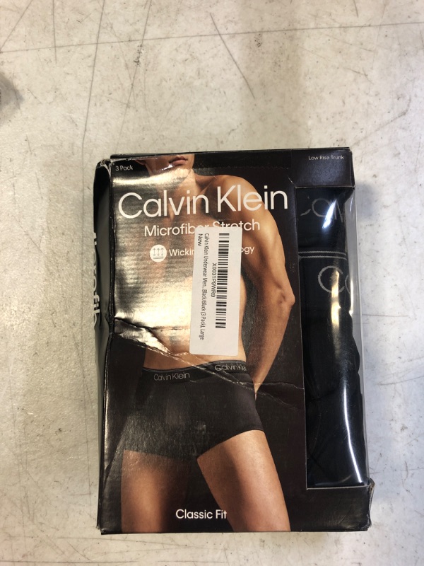 Photo 2 of Calvin Klein Underwear Men's Micro Stretch 3-Pack Low Rise Trunk, Black/Black/Black (3 Pack), Large
