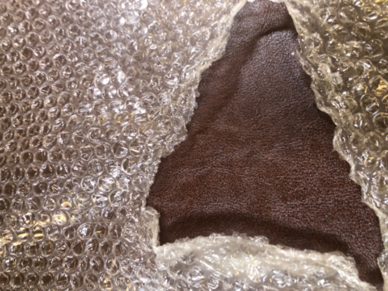 Photo 1 of BROWN LEATHER ACCENT CHAIR