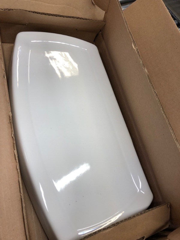 Photo 1 of American Standard ADA Toilet-to-GO W/Bone Finish 4149A104.020 CHAMPION4 HET 1.28 Tank WHT, 9.1 in wide x 18 in tall x 14.7 in deep, White
