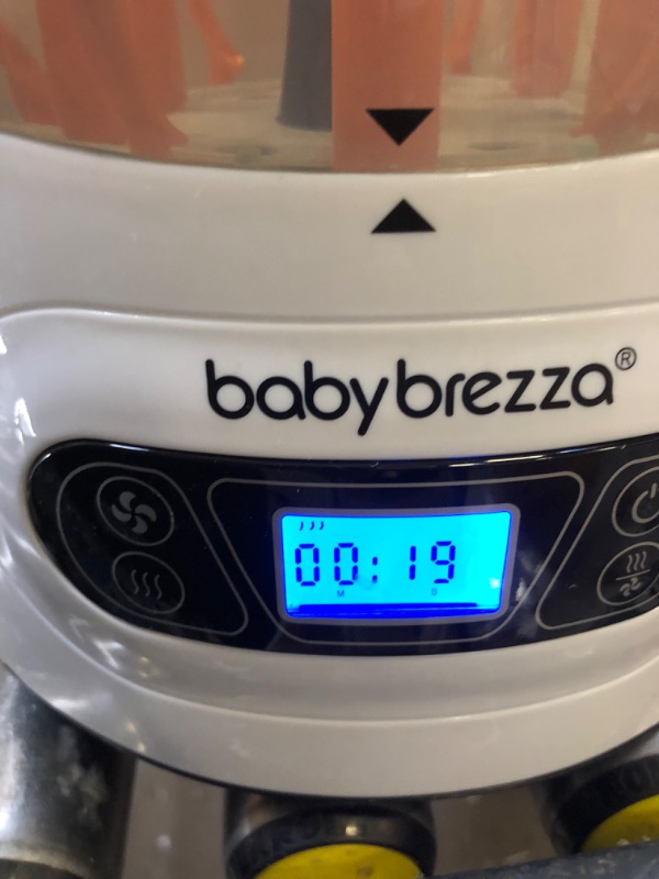 Photo 3 of Baby Brezza Baby Bottle Sterilizer and Dryer Machine – Electric Steam Sterilization - Universal Fit - Pacifiers, Glass, Plastic, and Newborn Feeding Bottles
