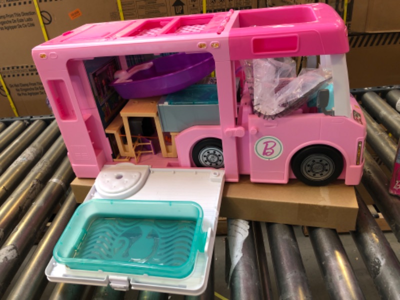 Photo 3 of Barbie Camper 3-in-1 DreamCamper Toy Playset Transforming Camper with Pool, Truck and Boat 60 Barbie Accessories Kids Toys and Gifts
