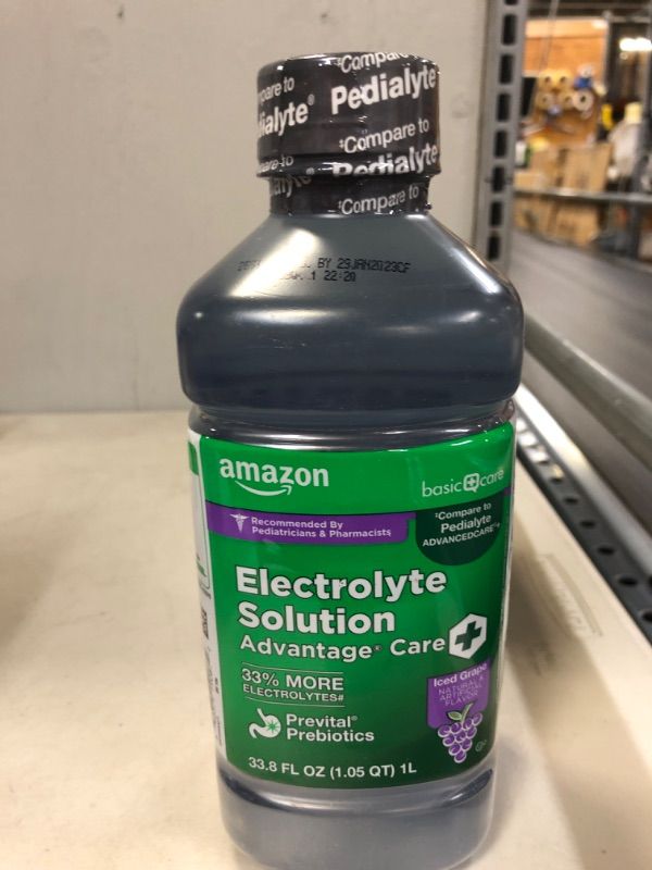 Photo 2 of AMAZON BASIC CARE ADVANTAGE CARE PLUS ELECTROLYTE SOLUTION, ICED GRAPE, HELPS PREVENT DEHYDRATION, FLUIDS, ZINC AND ELECTROLYTES, 1 LITER---exp date 01-2023