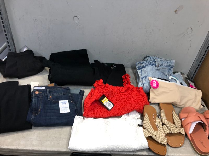 Photo 1 of BAG LOT OF WOMEN CLOTHES -DIFFERENT STYLES AND SIZE ---SOLD AS IS ---