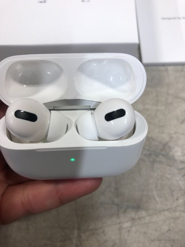 Photo 4 of Apple AirPods Pro (1st Generation) with MagSafe Charging Case --SERIAL NUMBER. H6VJ69DX1059