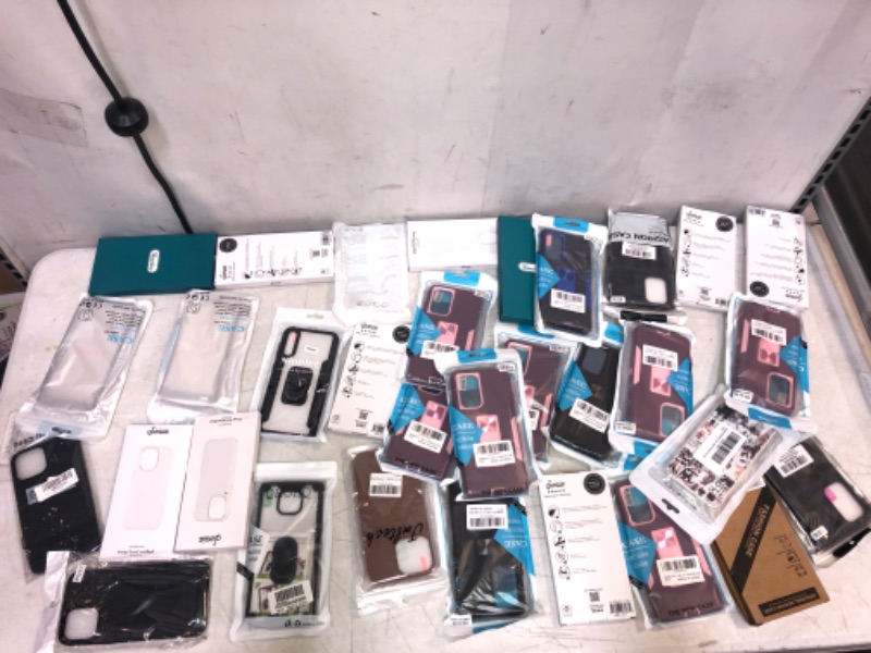 Photo 1 of MISC LOT OF CELL PHONE CASES 