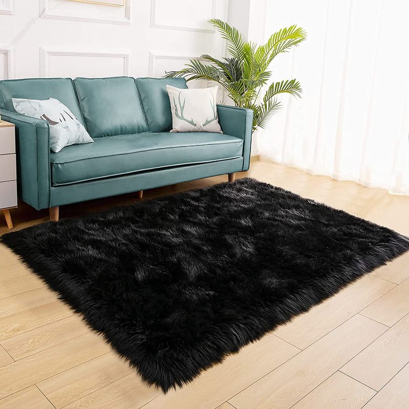 Photo 1 of CAROMIO Shaggy Soft Faux Sheepskin Fur Area Rugs Floor Mat Luxury Beside Carpet Decorative Plush Shag Furry Carpet for Bedroom Living Room Floor, Black, 4 x 6 Feet, Rectangle
