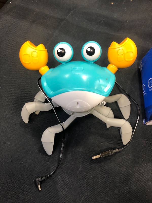 Photo 2 of Adebena Sensing Crawling Crab, Tummy Time Baby Toys with Music Sounds & Lights, Fun Early Development Walking Dancing Crab Toy, Infant Birthday Gifts for Babies Boys Girls Toddlers, USB Rechargeable
