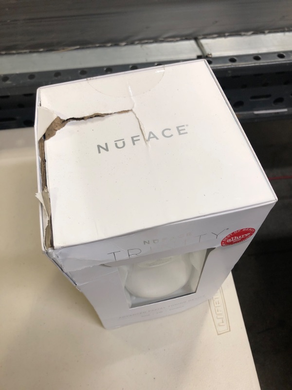 Photo 2 of NuFACE Trinity Starter Kit - Facial Toning Device
MINOR DAMAGE TO BOX - SEALED OPEN BOX FOR PICTURES