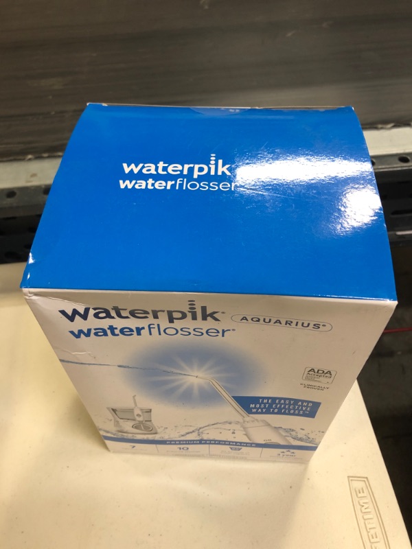 Photo 2 of Waterpik Aquarius Water Flosser Professional For Teeth, Gums, Braces, Dental Care, Electric Power With 10 Settings, 7 Tips For Multiple Users And Needs, ADA Accepted, White WP-660
SEALED 