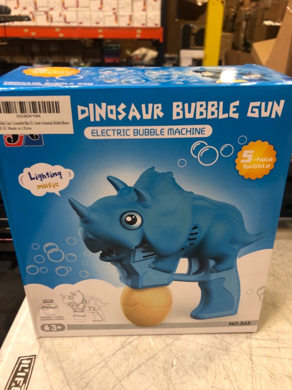 Photo 2 of Coomarble Dinosaur Bubble Gun Machine, Bubble Machine with LED Light and Music, Handheld Electric Bubble Maker for Kids, Party Favors with 2 Bubble Refill Solutions, 3 Batteries Included-----factory sealed