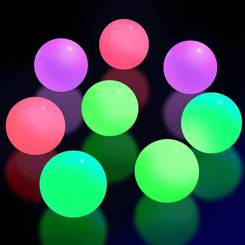 Photo 1 of 12 Pieces Ceiling Balls Glow in The Dark Stress Balls Sticky Balls That Stick to The Ceiling Glowing Balls for Relax Toy Teens and Adults... COLORS ARE PINK , BLUE , GREEN , YELLOW 