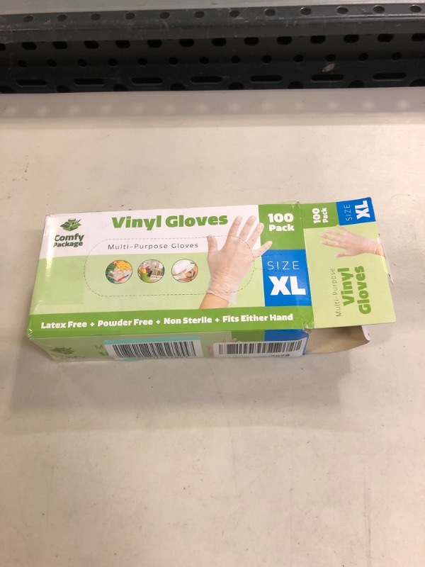 Photo 2 of [100 Pack] Clear Powder Free Vinyl Disposable Plastic Gloves SIZE XL ( USED) 
