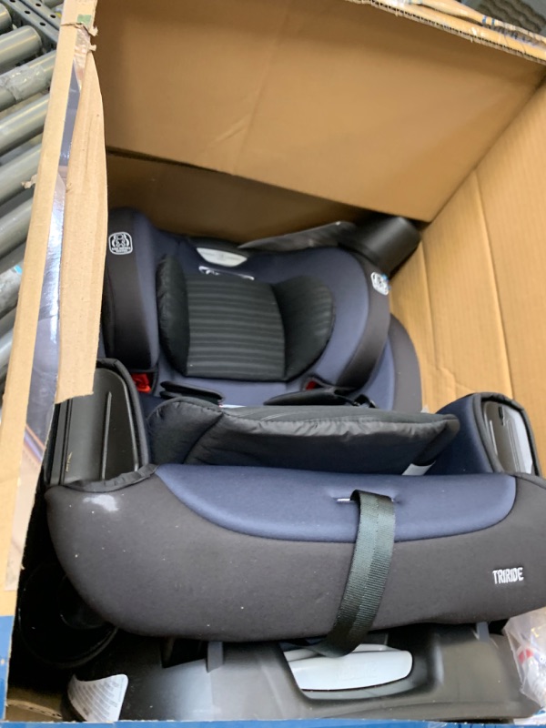 Photo 3 of Graco TriRide 3 in 1 Car Seat 3 Modes of Use from Rear Facing to Highback Booster Car Seat, Box Packaging Damaged, Minor Use, Minor Scratches and Scuffs on Plastic, Missing Cupholders. Hair Found on item