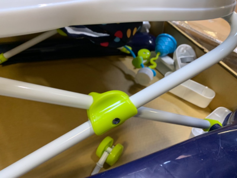 Photo 1 of Baby Trend 2.0 Activity Walker - Blue Sprinkles, Box Packaging Damaged, Minor use, Minor Scratches and Scuffs on Plastic, Missing Some Toy Accessories. 
