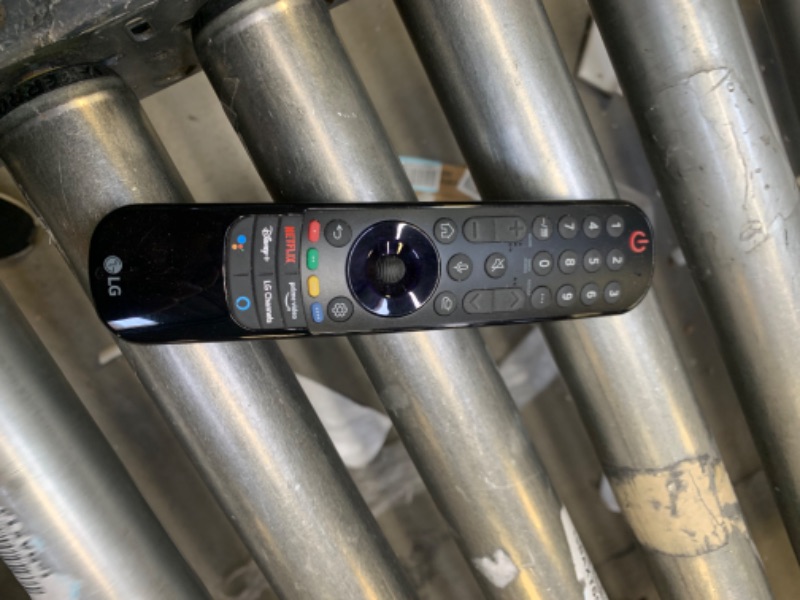 Photo 1 of LG TV Remote, No Box Packaging, Moderate Use, Scratches and Scuffs on item
