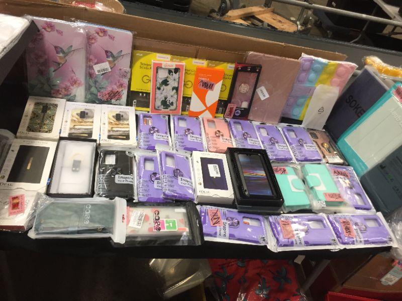 Photo 1 of VARIOUS CASES FOR DIFFERENT MODELS OF ELECTRONIC DEVICES