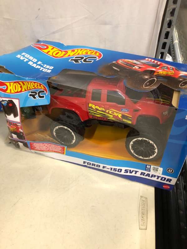 Photo 2 of ?Hot Wheels Remote Control Truck, Red Ford F-150 RC Vehicle With Full-Function Remote Control, Large Wheels & High-Performance Engine, 2.4 GHz With Range of 65 Feet

