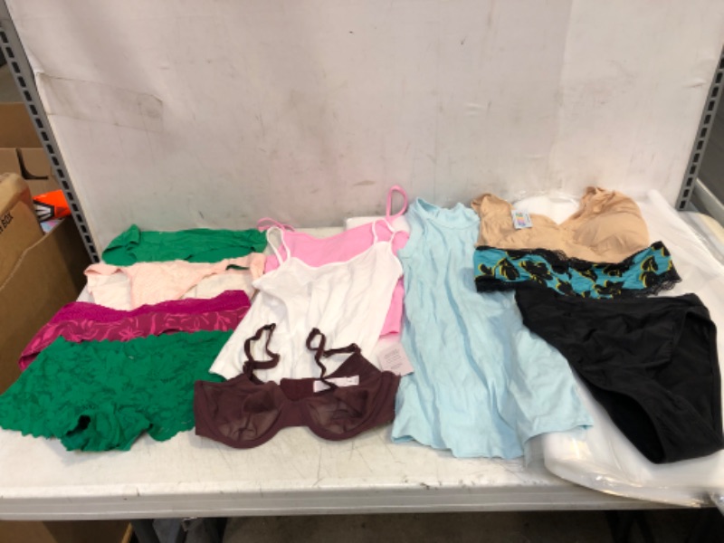 Photo 1 of ASSORTED CLOTHING BUNDLE, VARIOUS SIZES AND COLORS, CLOTHING SOLD AS IS
