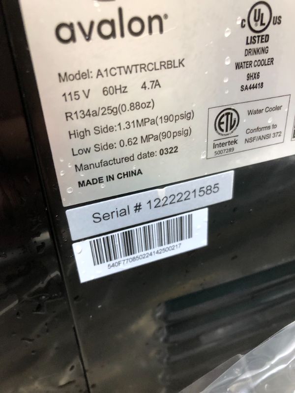 Photo 2 of Avalon Premium Hot/Cold Top Loading Countertop Water Cooler Dispenser With Child Safety Lock. UL/Energy Star Approved- Black----there is still some moisture around the item ---bottle not included 

