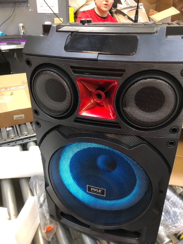 Photo 5 of Portable Bluetooth PA Speaker System - 800W 10” Rechargeable Speaker, TWS, Party Light, LED Display, FM/AUX/MP3/USB/SD, Wheels - Wireless Mic, Remote Control, Tablet Holder Included - Pyle PHP210DJT------there is a crack on the top part view pictures 
