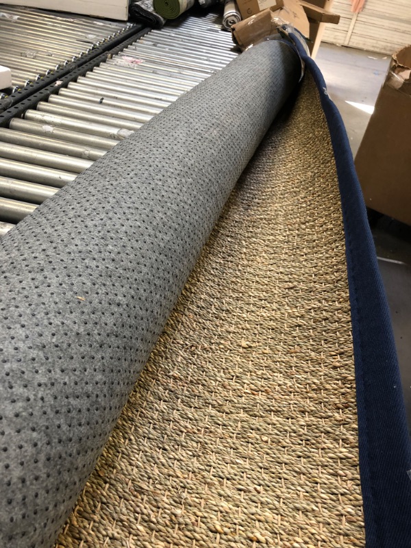 Photo 1 of 6'x9' area rug ------cleaning needed 