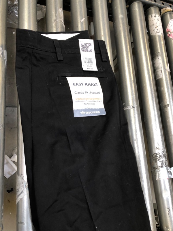 Photo 3 of Dockers Men's Classic Fit Easy Khaki Pants - Pleated (Standard and Big & Tall)  34x36   there is some lint and hair on the pants 
