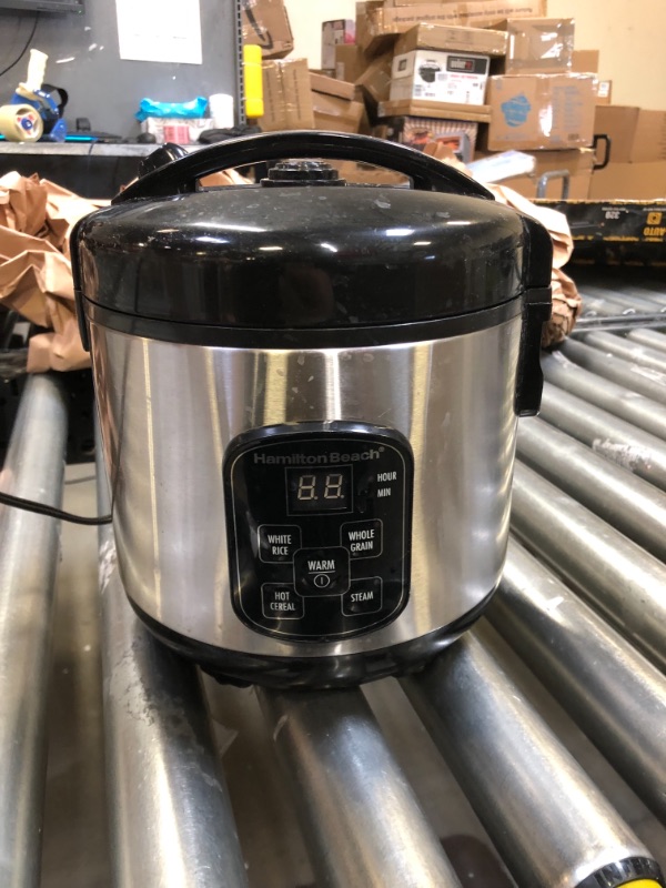 Photo 1 of hamilton beach (37518) rice cooker, 4 cups uncooked resulting in 8 cups cooked with steam & rinse basket *** ITEM HAS MARKS AND DEBRIS FROM PRIOR USE ***