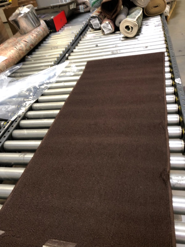Photo 1 of 20" x5' runner rug ---cleaning needed 