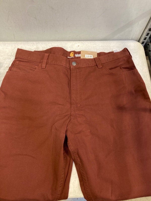 Photo 2 of Carhartt Men's Rugged Flex Relaxed Fit Canvas 5-Pocket Work Pant | Mineral Red | 38W 32L

38X32