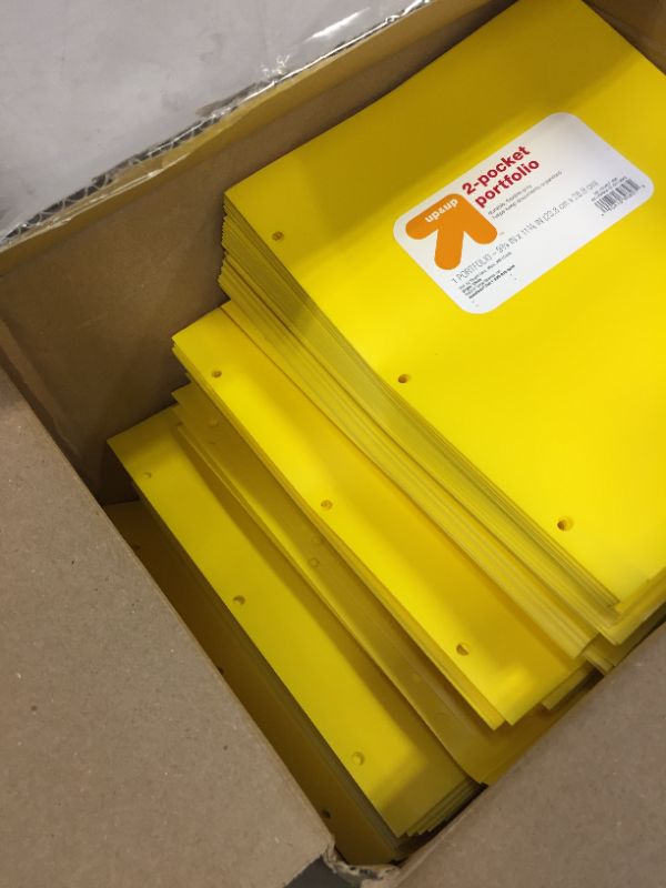 Photo 2 of box full of 2 pocket portfolios (yellow)