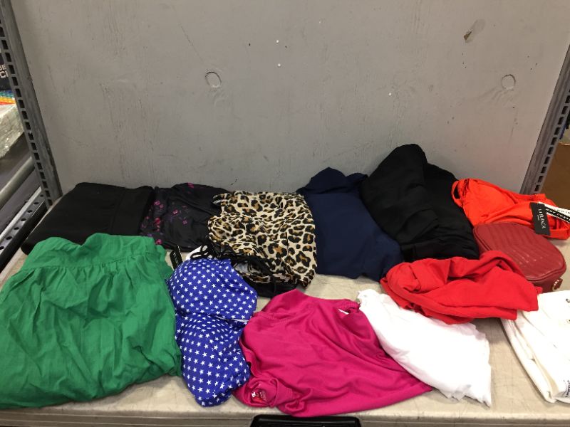 Photo 1 of BAG LOT OF CLOTHES DIFFERENT STYLES AND SIZES ---SOLD AS IS ---