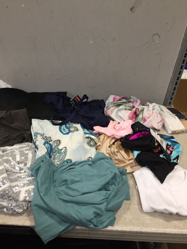Photo 1 of BAG LOT OF WOMENS CLOTHING DIFFERENT STYLES AND SIZES --SOLD AS IS --