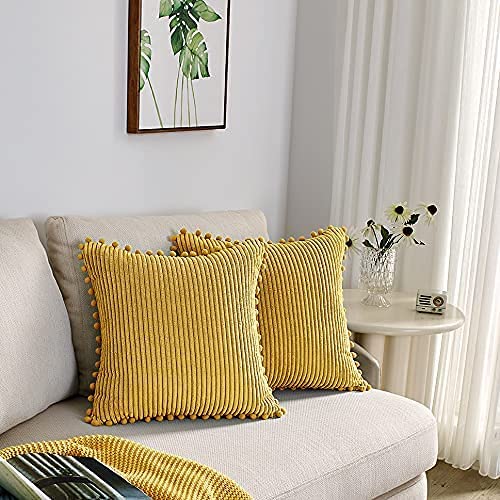 Photo 1 of  LEISROUL Decorative Throw Pillow Covers with Cute Pompoms,Boho Accent Pillows for Bedroom and Living Room (Yellow, 20" 20")
