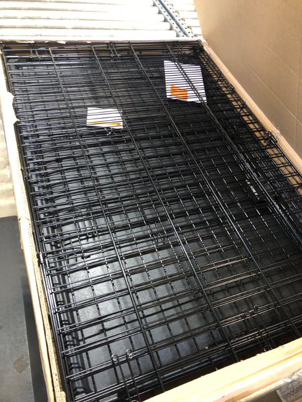 Photo 2 of Amazon Basics Foldable Metal Wire Dog Crate with Tray, Single or Double Door Styles 42" Single Door w/ Divider Crate-------lightly used