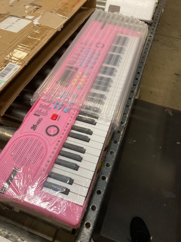 Photo 1 of 24HOCL 61 Keys Keyboard Piano, Kids Piano Keyboard with UL Adapter, Stand, Built-In Speaker, Mic, Portable Electronic Keyboard for Boys, Girls, Beginners Birthday Holidays Best Gifts Pink,Keyboard Piano_02----------turns on